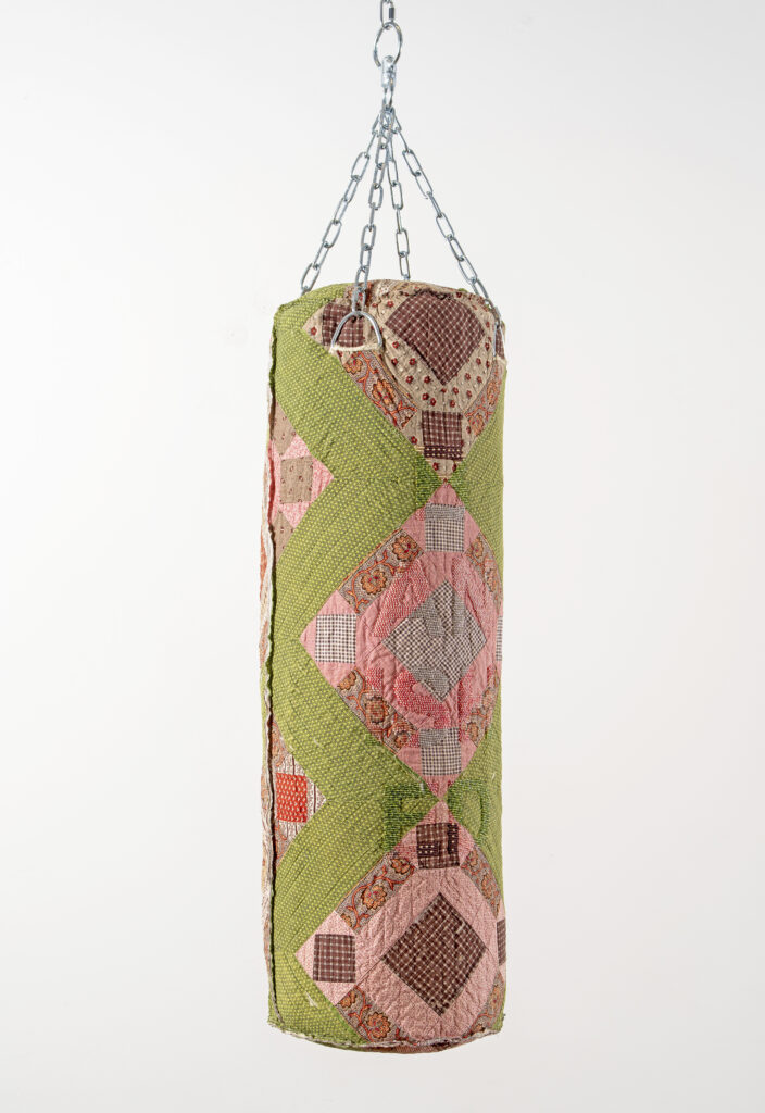 Holly Ballard Martz, Eve (BANISHED); vintage quilt, glass seed beads, thread, hardware; 49" x 12.5" x 12.5"; 2025; Steven Miller