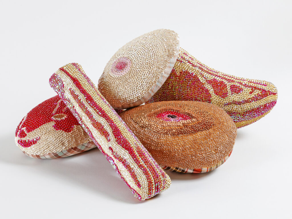 Holly Ballard Martz, Prime Cuts; vintage dressmakers' hams, sequins, glass seed beads, steel straight pins; dimensions variable; 2020; Steven Miller