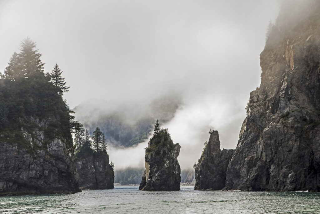 Fog,Covers,Sea,Stacks,In,Seward,,Alaska. Fog,Covers,Sea,Stacks,In,Seward,,Alaska.