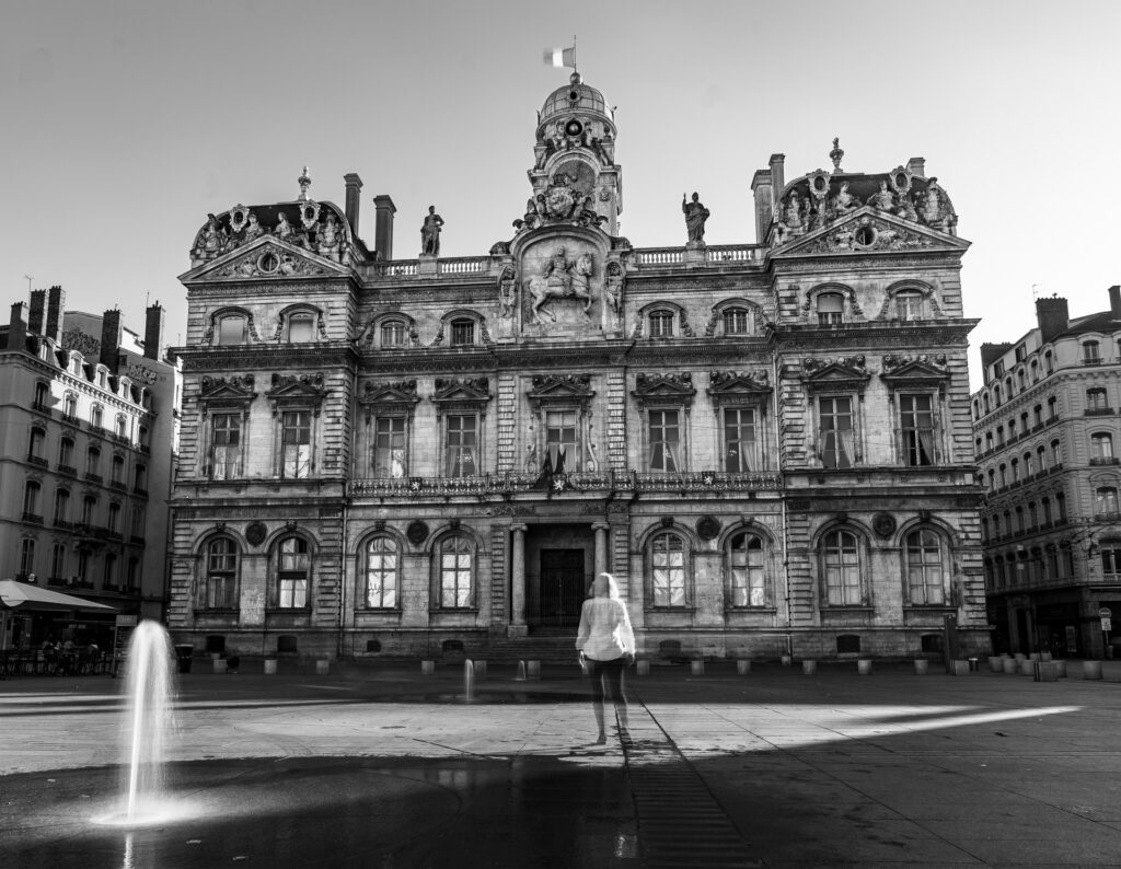 Ellen Sollod, La Flanêuse (Hotel de Ville), archival pigment print, 35"h x 44"w, 2026, photo credit: Ellen Sollod