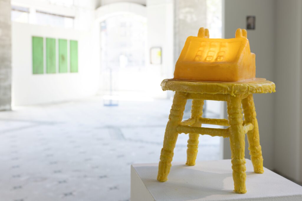 Nadia_Ahmed_please_leave_a_message_2026_Latex_beeswax_light_found_object_13.5”x8.5”x11”_2026